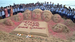 989 sand sculpture by sudarsan pattnaik to condemn the terrorist attack in peshawar 300x170