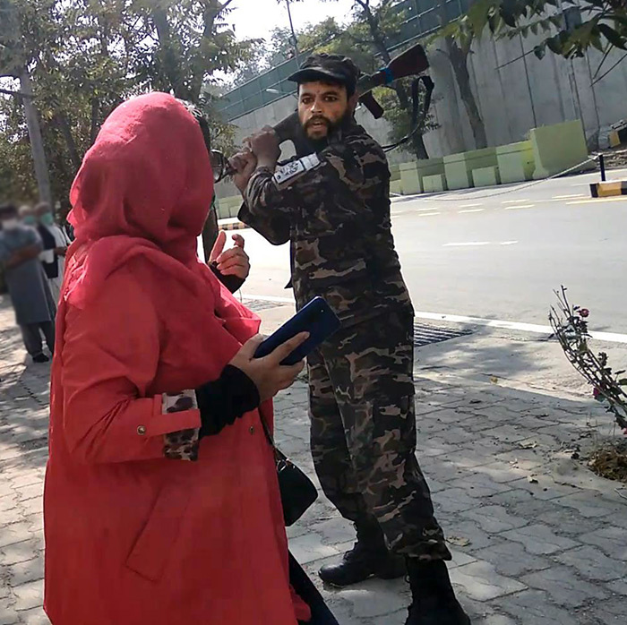 taliban beating woman protester kabul